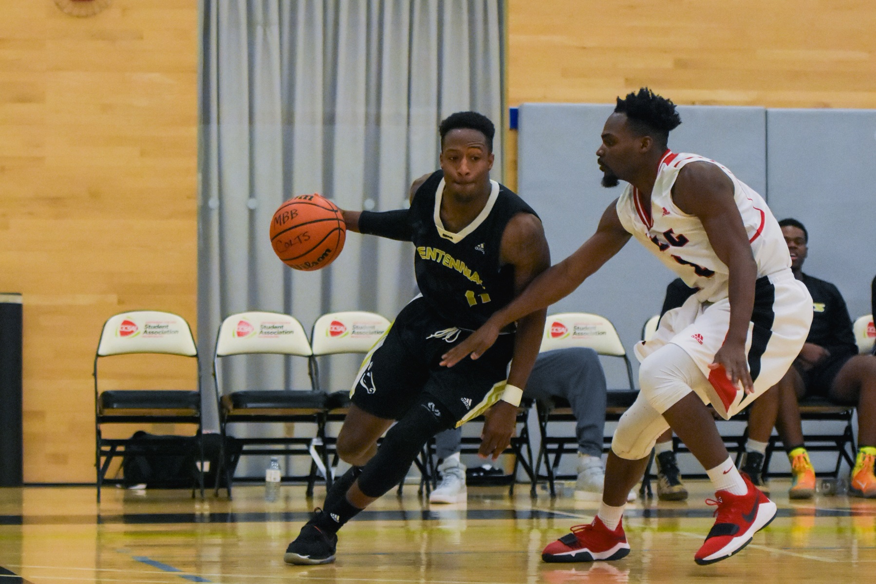 Centennial Colts forward Alastair Cole drives to the basket in second half action against the St. Lawrence Vikings at Athletic and Wellness Centre. Cole's game high 24 points led Centennial to a 81-75 win over St. Lawrence. (Yvano Antonio/ Colts Athletics)