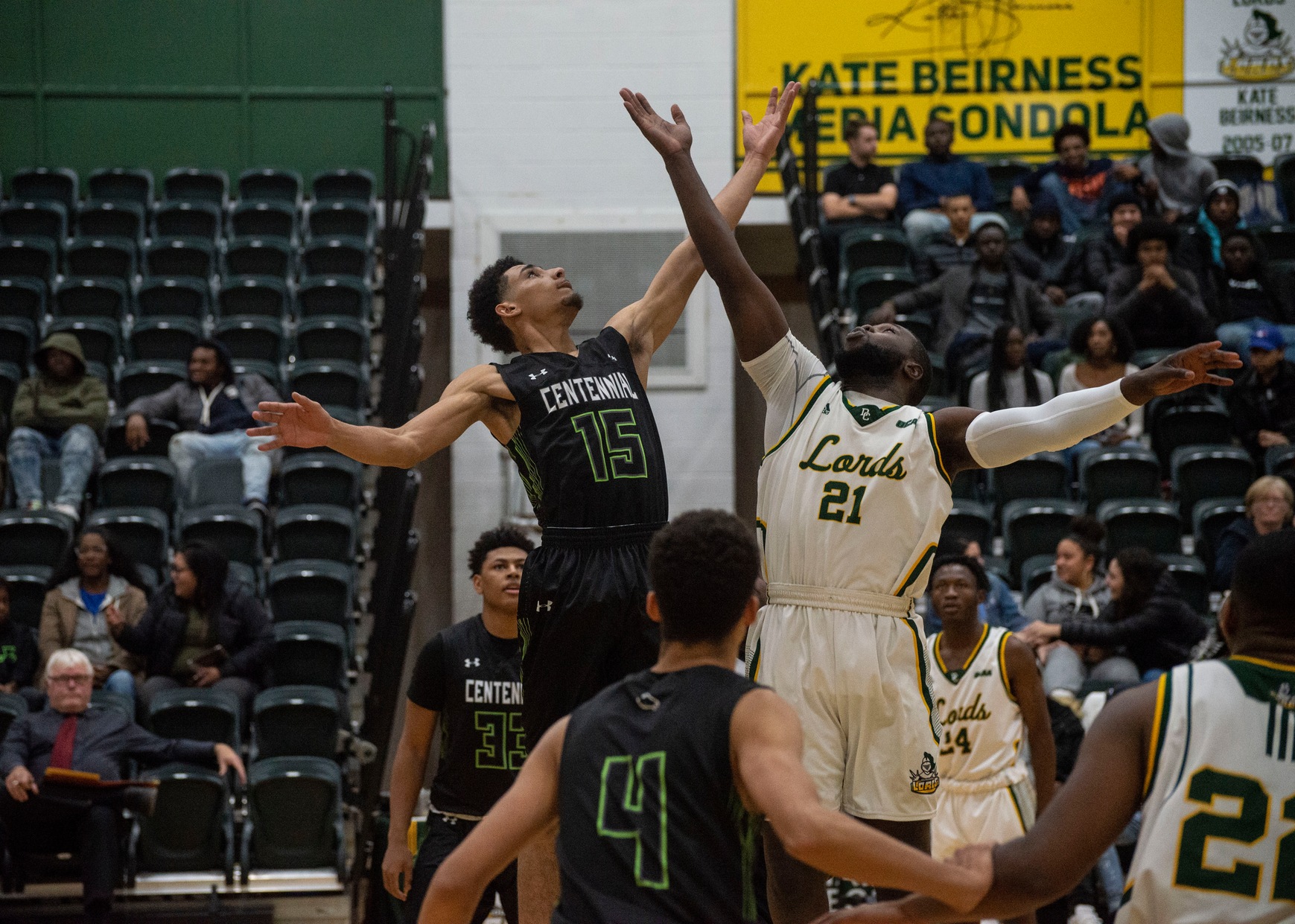 Centennial's Kyrin Henlin and Durham's Julian Hinckson Jr. jump for tip off between the two teams in Oshawa, Ont. (Kajan Thiruthanikasalam/Colts Media)