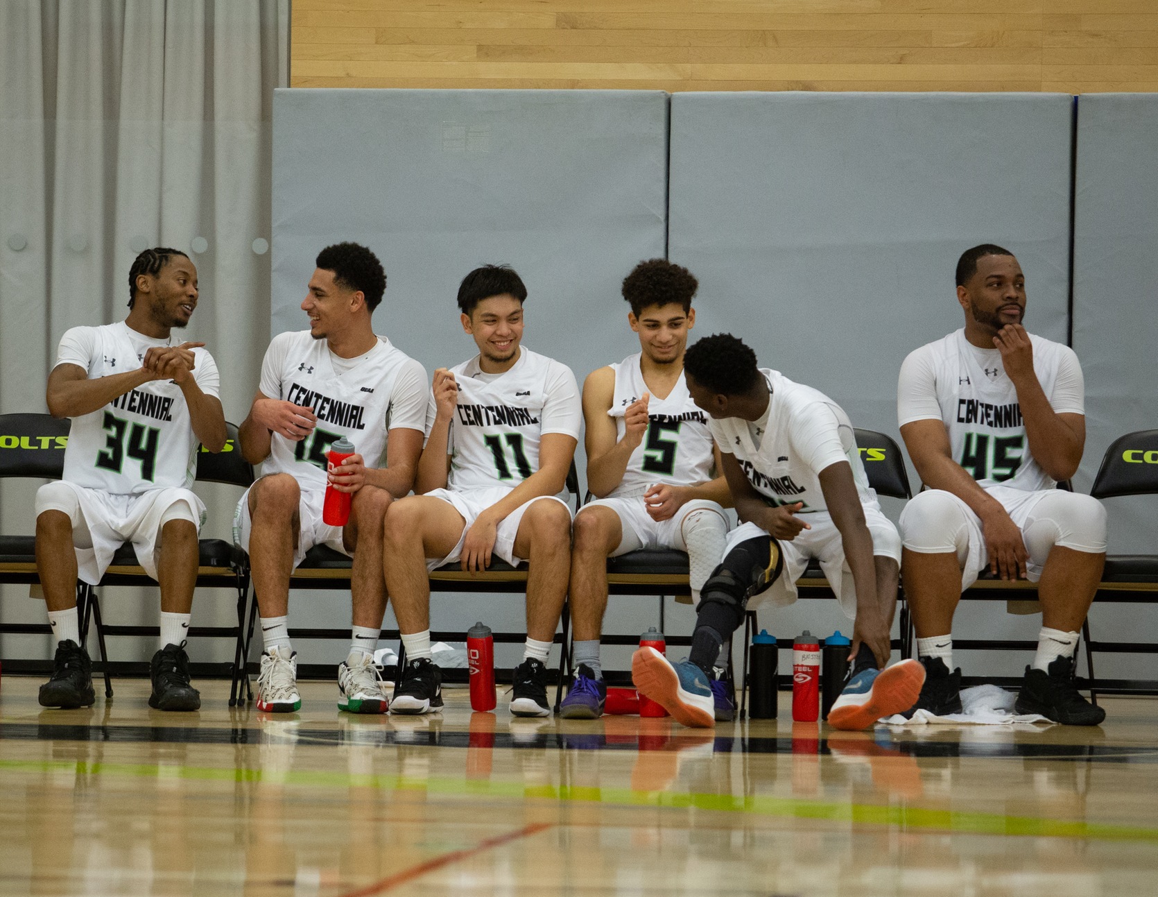 The smiles on the Colts' faces say it all as they blow out the Canadore Panthers Friday night at the AWC. (Nicole Ventura/Colts Media)