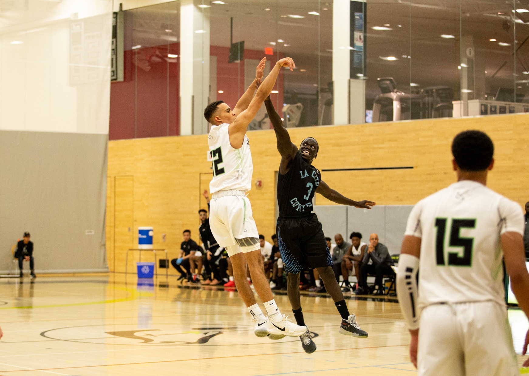 The Colts' Quentin Herbert fires up a contested triple that hits nothing but net during second quarter action between Centennial and the La Cite Coyotes at the Athletic and Wellness Centre. (Nicole Ventura/Colts Media)