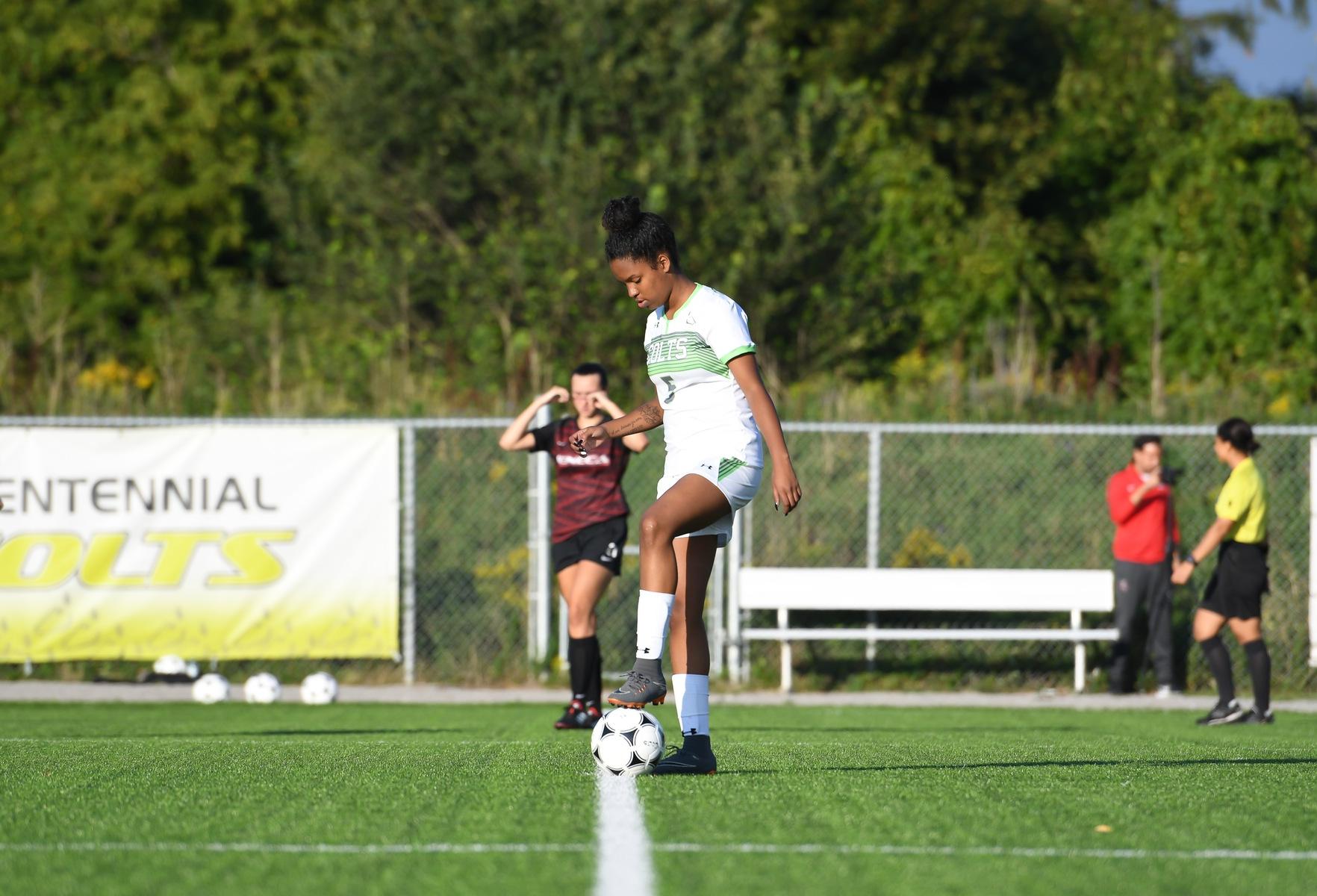 Centennial Colts forward Sayla Peters stands at the centre circle of the Progress Turf Field as she awaits the season opening kickoff between Centennial and the Seneca Sting. The Sting won this game, 4-0. (Khree Fearman/Colts Media)
