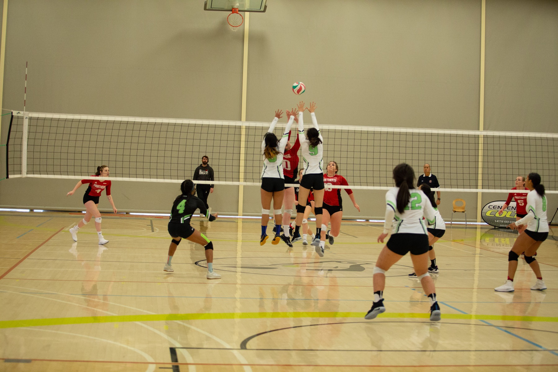 Heather Sanchez and Emily Joe go sky high for the block during game action at the Athletic and Wellness Centre between the Colts and the Panthers. (Nicole Ventura/Colts Media)
